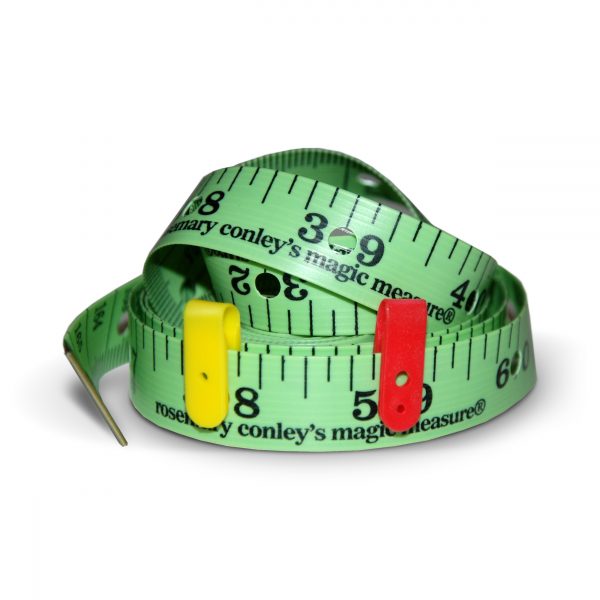 A Magic Measure tape measure coiled up with tags