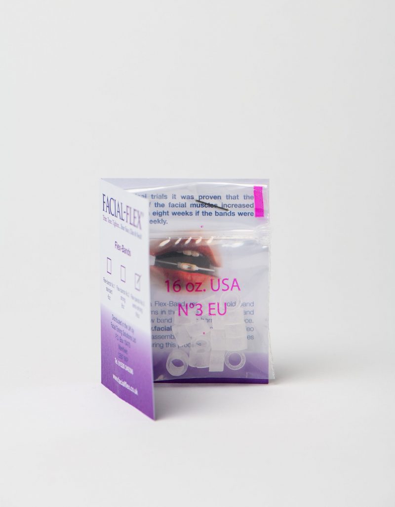 Card with packet of No 3 Facial Flex bands stapled to it