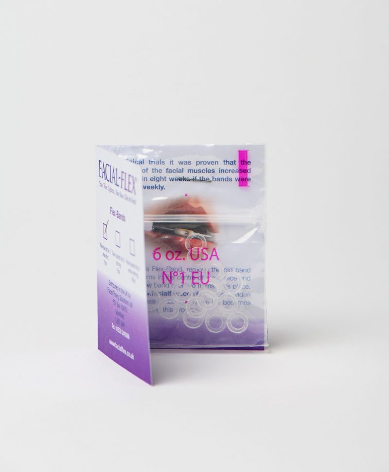 Card with packets of No 1 Facial Flex bands stapled to it