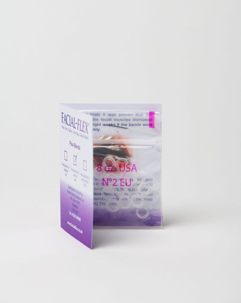 Card with packet of No 2 Facial Flex bands stapled to it