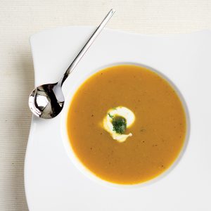 A bowl of spicy, curried butternut squash soup