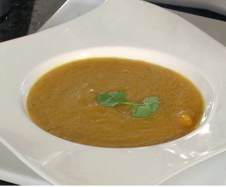 A bowl of carrot and coriander soup