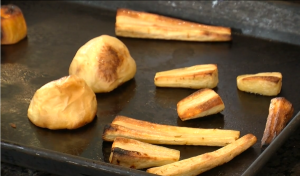 Dry-Roasted Potatoes and Parsnips on a baking tray