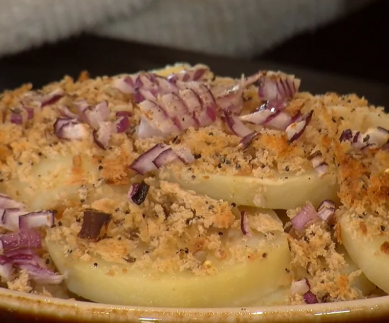 A close up of the crisped topping on the top of a dish of Vegetable Bake