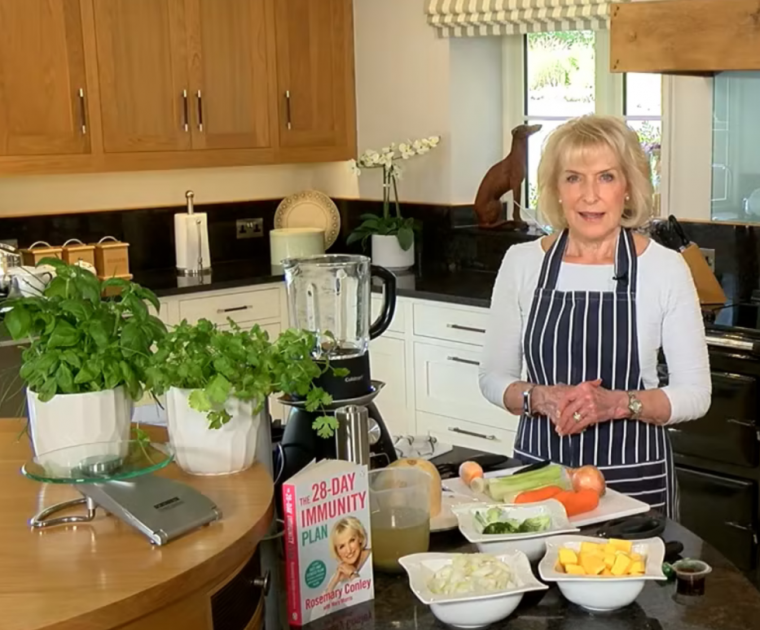 Rosemary Conley preparing to cook in her kitchen