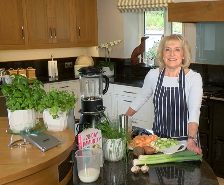 Rosemary Conley preparing to cook in her kitchen
