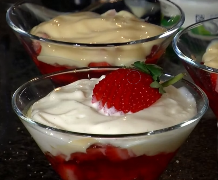 Luxury Low Fat Sherry Trifle in a glass bowl made of strawberries, jelly, custard, live yogurt, sherry and sponge fingers