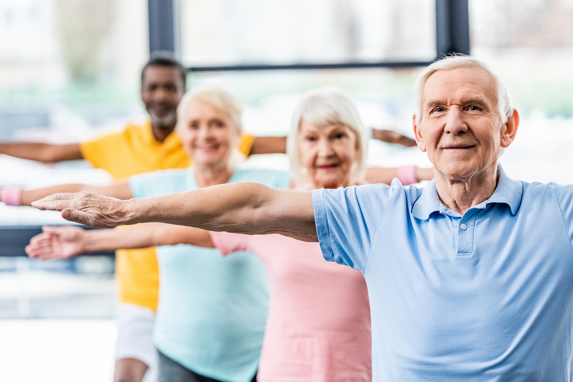 A group of mature people exercising