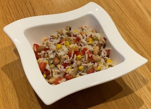 Rice and Bean Salad in a square white bowl
