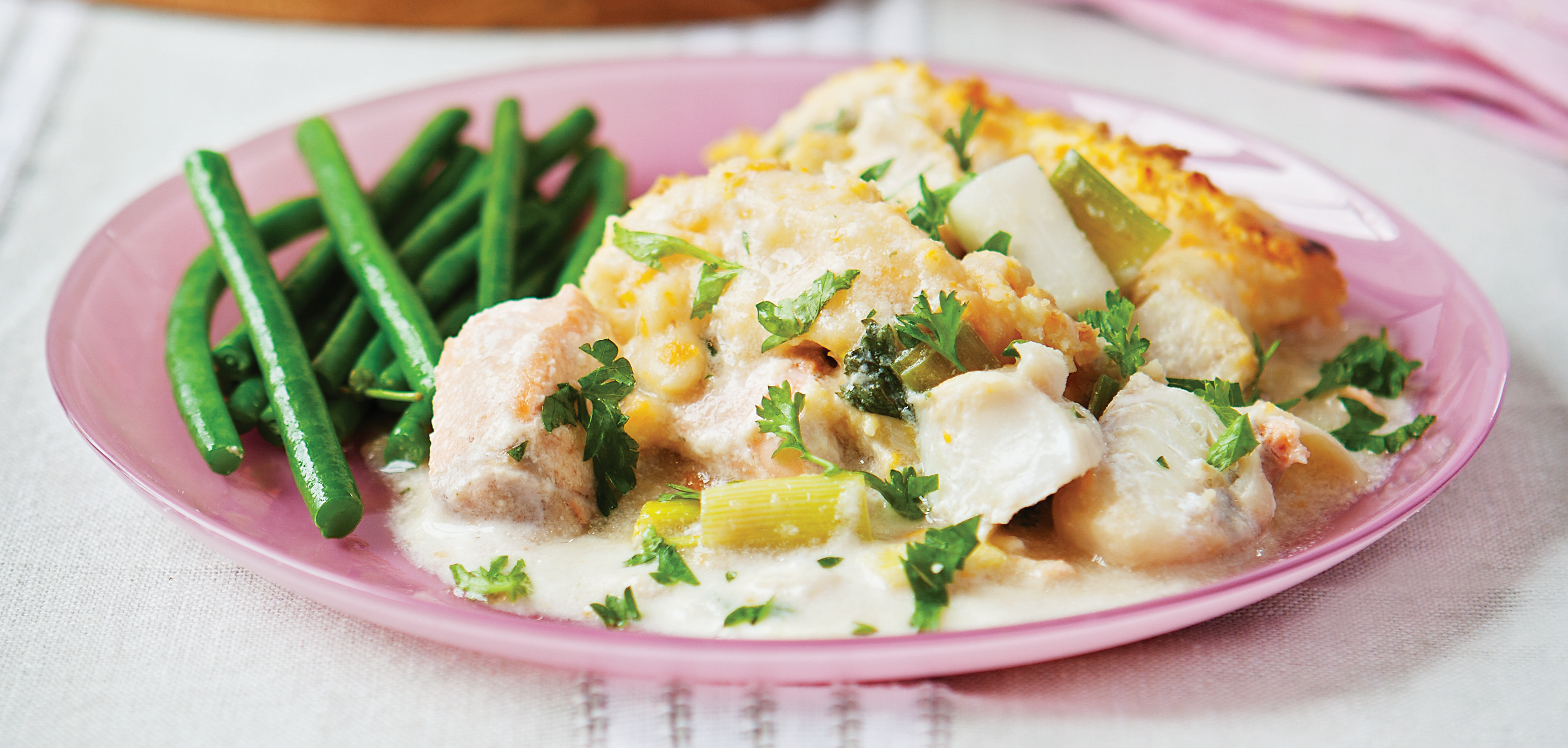 Horseradish Fish Pie on a pink plate